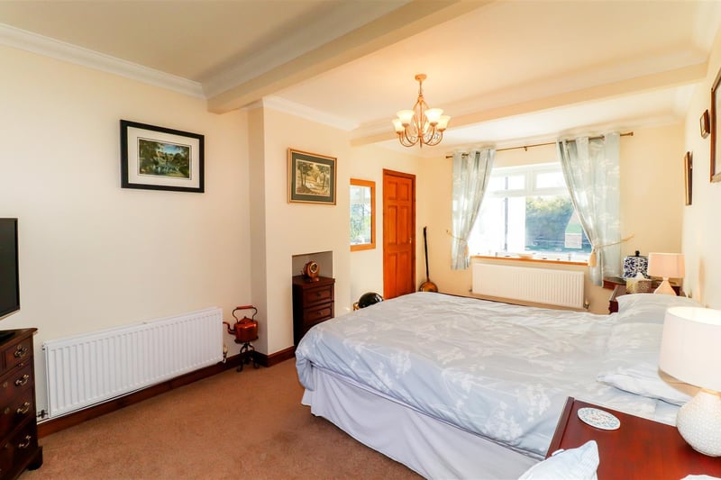 A second ground-floor reception room doubles as an extra bedroom.