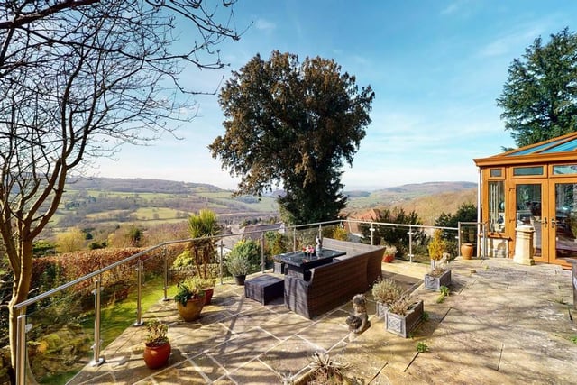 Far-reaching views across the Peak District National Park and Derwent Valley can be enjoyed from the patio and garden at the back of the property.
