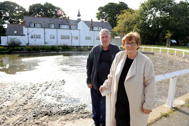 South Tyneside Council Leader, Cllr Tracey Dixon, at Whitburn Village Pond with Gary Johnston before the dredging took place.