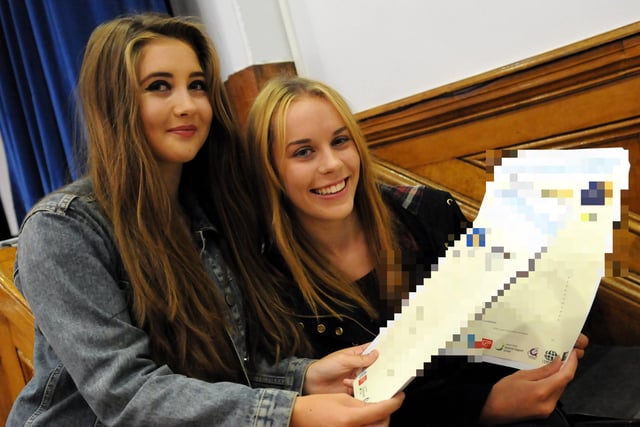 All smiles after receiving their GCSE results in 2014 at Harton Technology College.