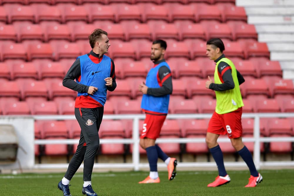 Sunderland players warm up ahead of Swindon Town clash.
