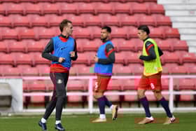 Sunderland players warm up ahead of Swindon Town clash.