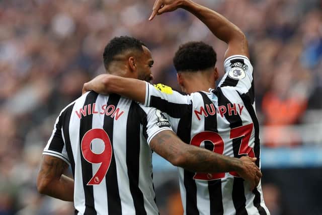 Callum Wilson celebrates with Newcastle United goalscorer Jacob Murphy.