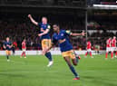 Alexander Isak of Newcastle United scores the team's second goal from a penalty kick  during the Premier League match between Nottingham Forest and Newcastle United at City Ground on March 17, 2023 in Nottingham, England. (Photo by Laurence Griffiths/Getty Images)