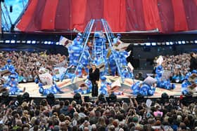 It is 15 years since Take That last performed in the city. Mark Owen takes centre stage.