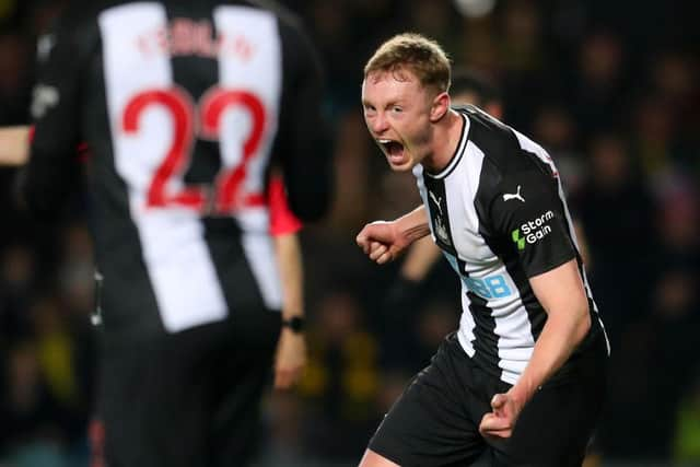 Sean Longstaff celebrates an FA Cup goal.