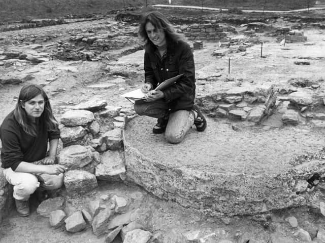 Archaelogists Leon Jazdzejewski, left and Eddie Dougherty, working on the excavated cold plunge bath of the private bath suite in the commanding officer's house of South Shields Roman Fort in 1991.