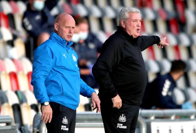 Steve Bruce and Steve Agnew, left.