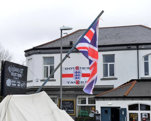 Notably the Union Jack survived the destruction at Dougie's Tavern.