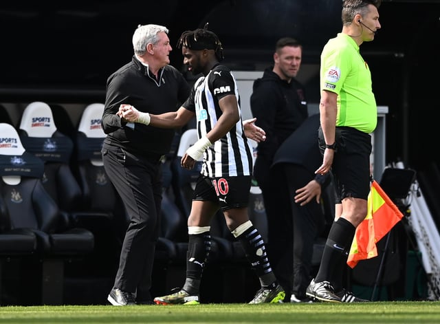 Newcastle player Allan Saint -Maximin is congratulated by manager Steve Bruce after being substituted during the Premier League match between Newcastle United and West Ham United at St. James Park