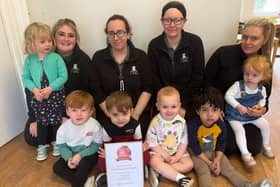 Youngsters and staff at Nurserytime South Shields celebrate their top listing.