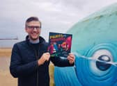 Sunderland author David Crosby with a copy of his new Pirates vs. Monsters picture book.