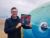 Sunderland author David Crosby with a copy of his new Pirates vs. Monsters picture book.