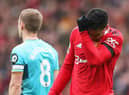 Casemiro of Manchester United looks dejected as he leaves the pitch after being shown a red card during the Premier League match between Manchester United and Southampton FC at Old Trafford on March 12, 2023 in Manchester, England. (Photo by Nathan Stirk/Getty Images)