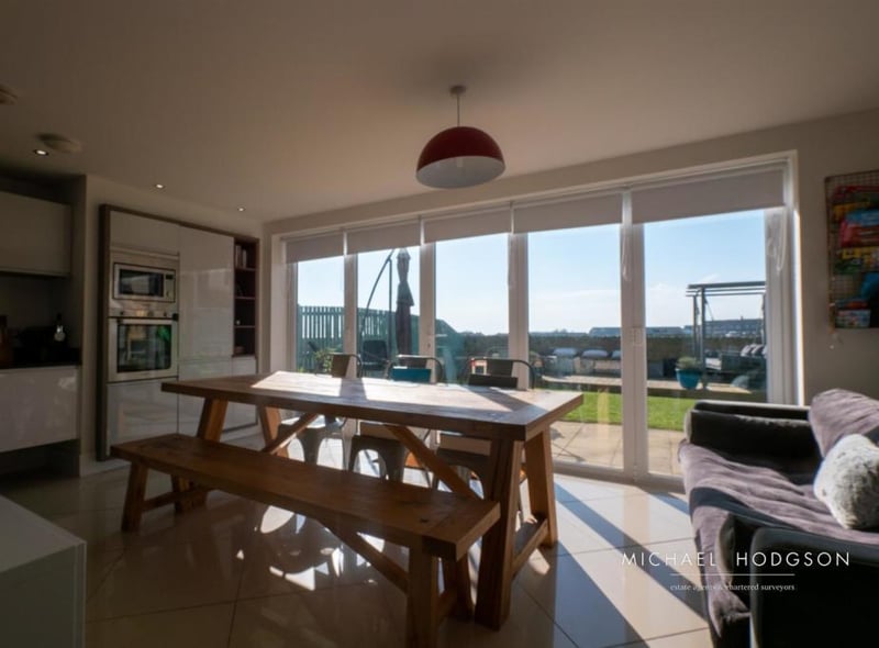 The open plan kitchen feels light and airy.