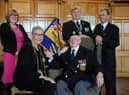 The Mayor of South Tyneside Cllr Pat Hay receives the first poppy from the Royal British Legion South Shields Branch President Peter Boyack, with Mayoress Mrs Jean Copp, Branch Chairman Anthony Paterson, and Branch Secretary George Coser, at South Shields Town Hall.