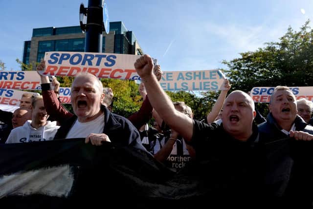 NEWCASTLE UPON TYNE, ENGLAND - SEPTEMBER 29:  Newcastle United fans protest against chairman Mike Ashley prior to the Premier League match between Newcastle United and Leicester City at St. James Park on September 29, 2018 in Newcastle upon Tyne, United Kingdom.  (Photo by Mark Runnacles/Getty Images)