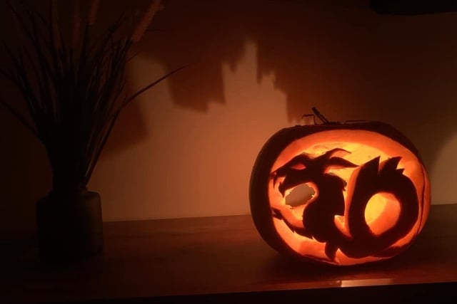 The Laidley Worm with Bamburgh Castle in the backgrond. Celebrating National Pumpkin Day and Halloween with SaFi Hagan.