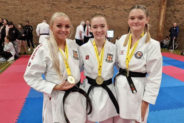 Eleisha Mitchinson, Elle Smith and Emma Snaith after winning team gold.