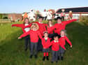 Marsden Primary School children with their scarecrow designs.