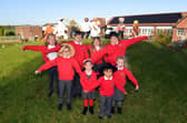 Marsden Primary School children with their scarecrow designs.