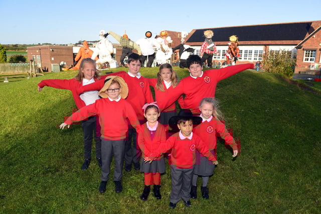 Marsden Primary School children with their scarecrow designs.
