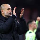 BOURNEMOUTH, ENGLAND - FEBRUARY 25: Pep Guardiola, Manager of Manchester City, applauds their fans after the Premier League match between AFC Bournemouth and Manchester City at Vitality Stadium on February 25, 2023 in Bournemouth, England. (Photo by Clive Rose/Getty Images)