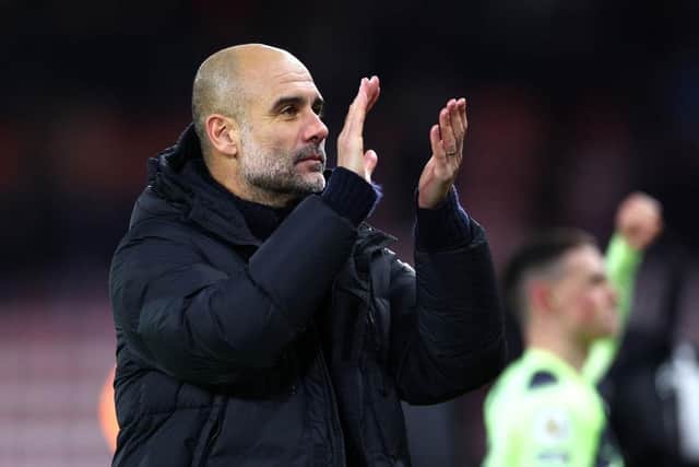 BOURNEMOUTH, ENGLAND - FEBRUARY 25: Pep Guardiola, Manager of Manchester City, applauds their fans after the Premier League match between AFC Bournemouth and Manchester City at Vitality Stadium on February 25, 2023 in Bournemouth, England. (Photo by Clive Rose/Getty Images)