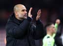 BOURNEMOUTH, ENGLAND - FEBRUARY 25: Pep Guardiola, Manager of Manchester City, applauds their fans after the Premier League match between AFC Bournemouth and Manchester City at Vitality Stadium on February 25, 2023 in Bournemouth, England. (Photo by Clive Rose/Getty Images)