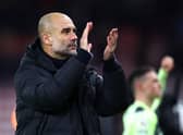 BOURNEMOUTH, ENGLAND - FEBRUARY 25: Pep Guardiola, Manager of Manchester City, applauds their fans after the Premier League match between AFC Bournemouth and Manchester City at Vitality Stadium on February 25, 2023 in Bournemouth, England. (Photo by Clive Rose/Getty Images)