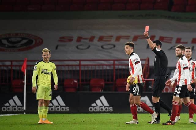 Ryan Fraser is sent off by Andy Madley.