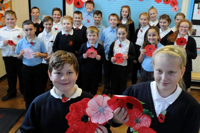 Pupils created their own poppies in 2014. Do you recognise anyone in this photo?