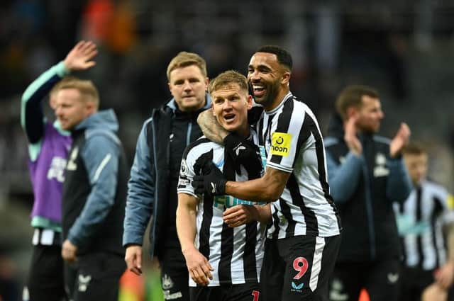 Substitutes Matt Ritchie and Callum Wilson celebrate after Newcastle United's win over Wolverhampton Wanderers.