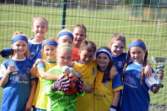 Jarrow FC U9's girls football team are the winners of last season's league.