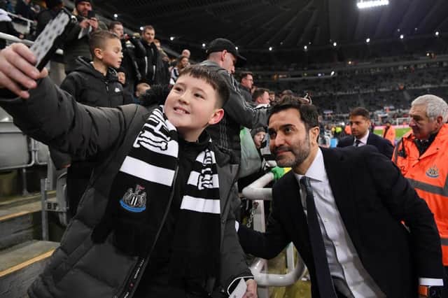 Newcastle United co-owner Mehrdad Ghodoussi poses for a photo with a young fan prior to the Carabao Cup Semi Final 2nd Leg match between Newcastle United and Southampton at St James' Park on January 31, 2023 in Newcastle upon Tyne, England. (Photo by Stu Forster/Getty Images)