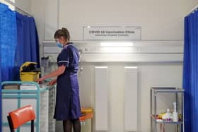 A nurse prepares a cubicle in the Covid-19 Vaccination Clinic at the University Hospital in Coventry, prior to the NHS administering jabs to the most vulnerable early next week. Picture: Steve Parsons/Pool/AFP via Getty Images.