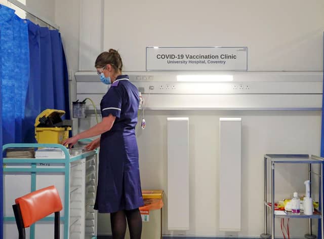 A nurse prepares a cubicle in the Covid-19 Vaccination Clinic at the University Hospital in Coventry, prior to the NHS administering jabs to the most vulnerable early next week. Picture: Steve Parsons/Pool/AFP via Getty Images.