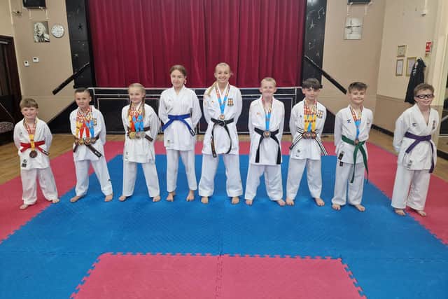 Some of the world championship squad back home with their medals.