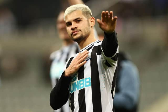 Bruno Guimaraes of Newcastle United acknowledges the fans following the Premier League match between Newcastle United and Wolverhampton Wanderers at St. James Park on March 12, 2023 in Newcastle upon Tyne, England. (Photo by Naomi Baker/Getty Images)