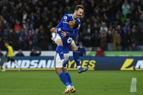 Youri Tielemans of Leicester City celebrates after scoring with James Maddison during the Premier League match between Leicester City and Newcastle United at The King Power Stadium on December 12, 2021 in Leicester, England. (Photo by Gareth Copley/Getty Images)