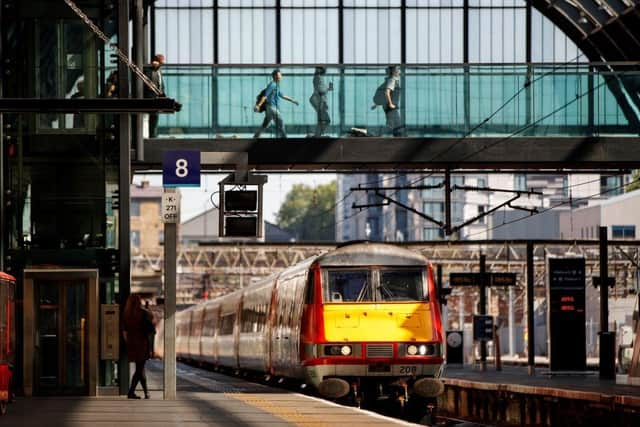 A LNER train approaches arrives at Kings Cross in London.