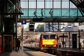 A LNER train approaches arrives at Kings Cross in London.