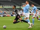 Manchester City's English defender Kyle Walker (2R) fouls Newcastle United's English midfielder Joe Willock to concede a penalty during the English Premier League football match between Newcastle United and Manchester City at St James' Park in Newcastle-upon-Tyne, north east England on May 14, 2021.