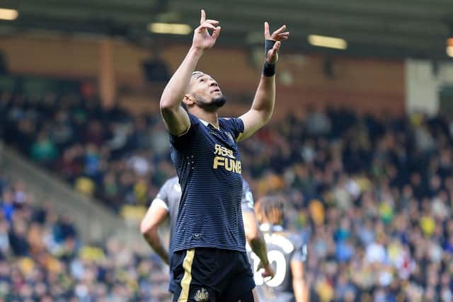 Joelinton of Newcastle United celebrates after scoring their side's first goal during the Premier League match between Norwich City and Newcastle United at Carrow Road on April 23, 2022 in Norwich, England. (Photo by Stephen Pond/Getty Images)