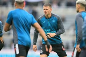 Newcastle United defender Sven Botman warms up before the Aston Villa game.