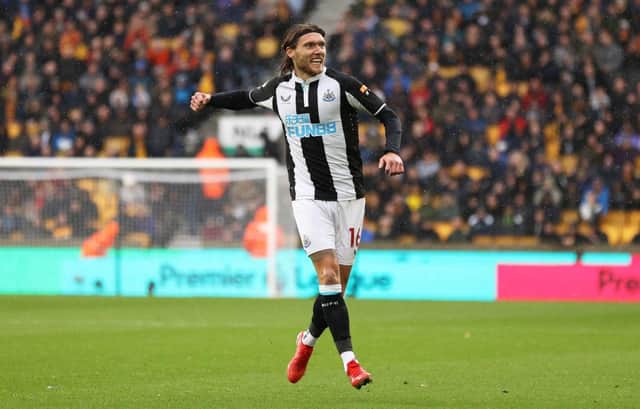 Jeff Hendrick of Newcastle United celebrates after scoring their side's first goal during the Premier League match between Wolverhampton Wanderers and Newcastle United at Molineux on October 02, 2021 in Wolverhampton, England. (Photo by Naomi Baker/Getty Images)