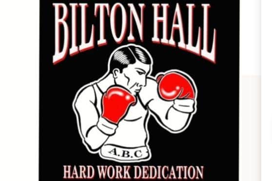 The boxing club's logo says it all.