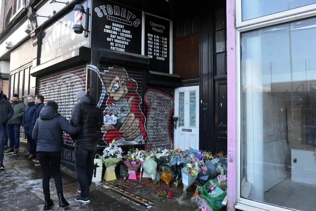Flowers were laid outside Allan Stone's barber shop at Laygate.