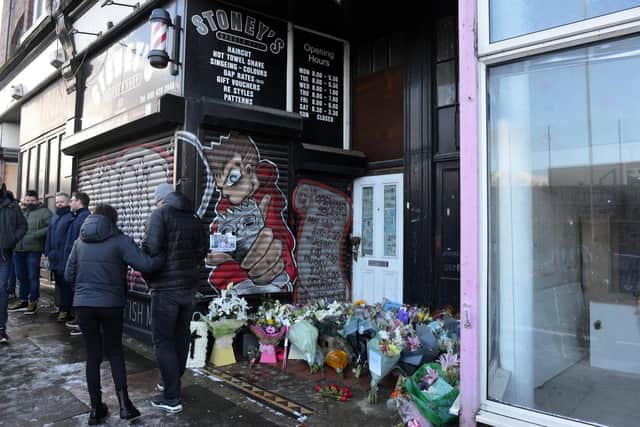 Flowers were laid outside Allan Stone's barber shop at Laygate.