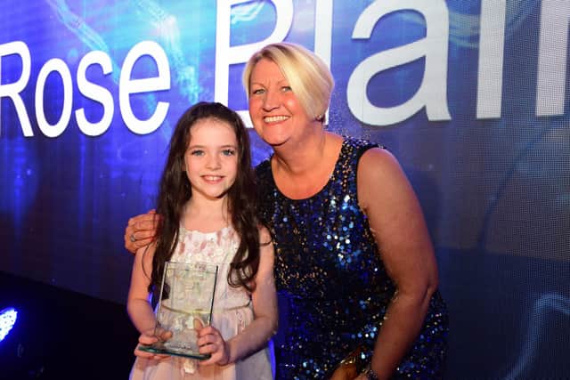 Rose Blair receiving her honour at the Best of South Tyneside Awards 2018 from Carolyn Bennett of Barbour.